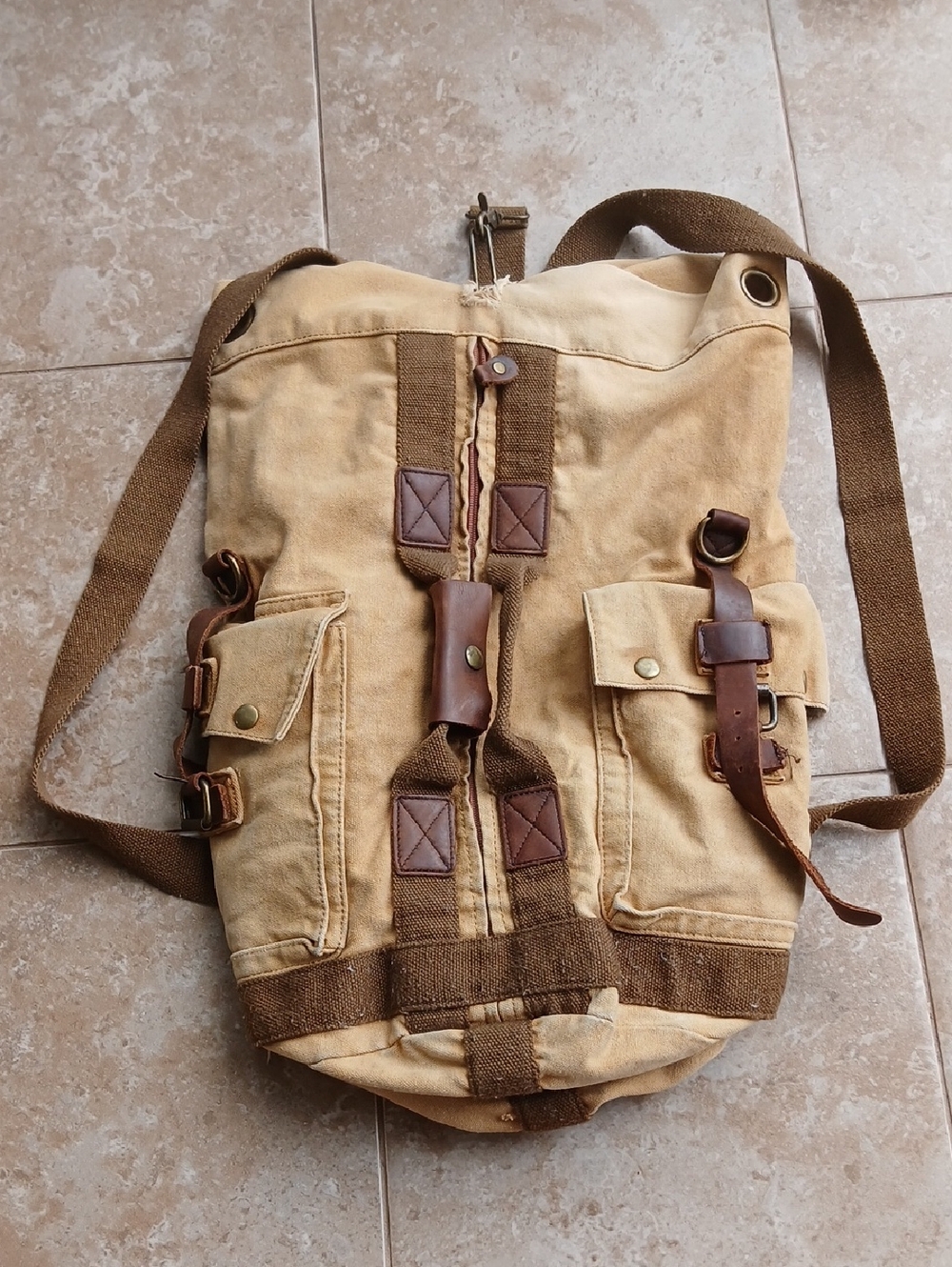 Vintage-Inspired Tan Canvas Roll-Top Backpack with Leather Accents